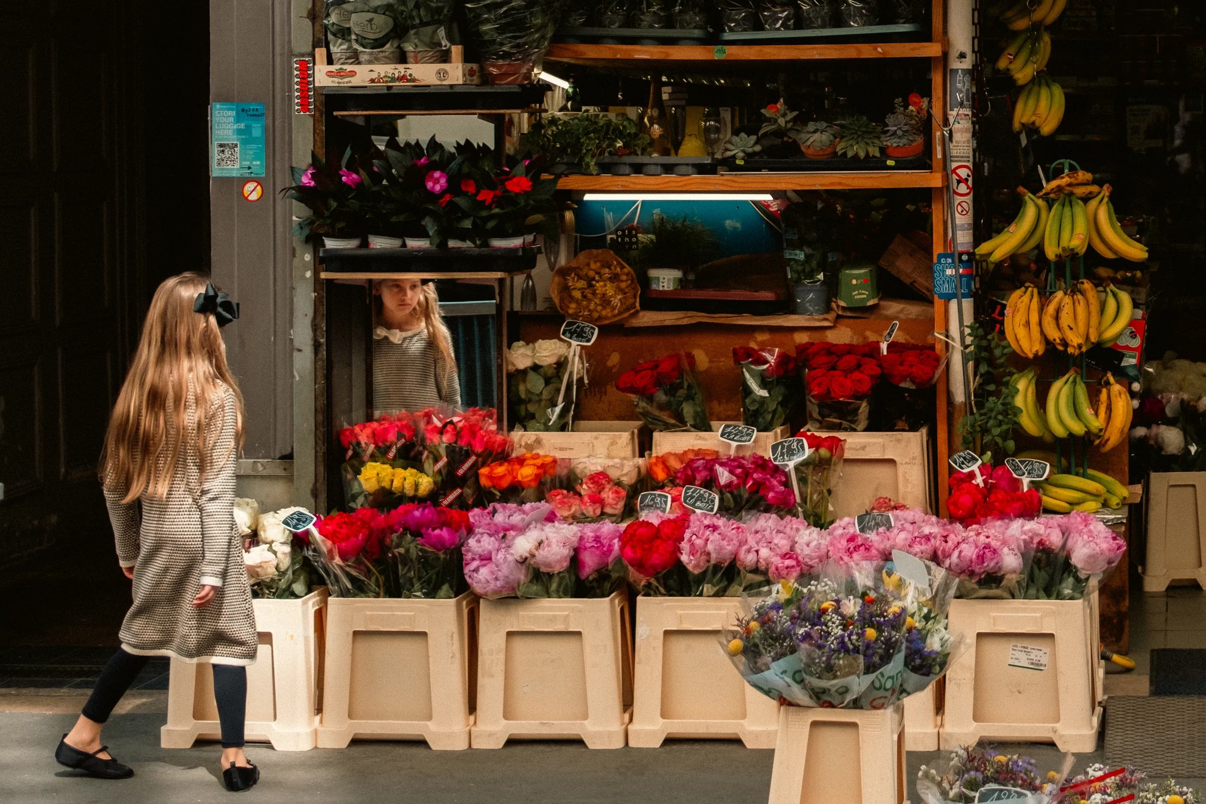 Woman with flowers, Paris, photographed by Campbell Jensen