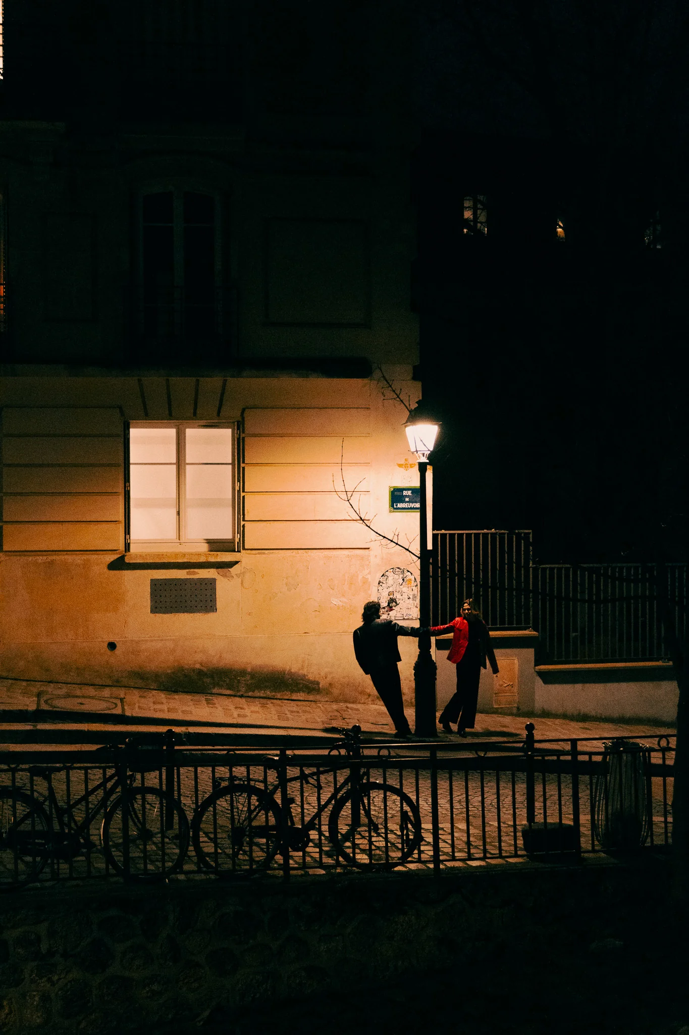 Figure on a Montmartre street at night, Paris, photographed by Campbell Jensen
