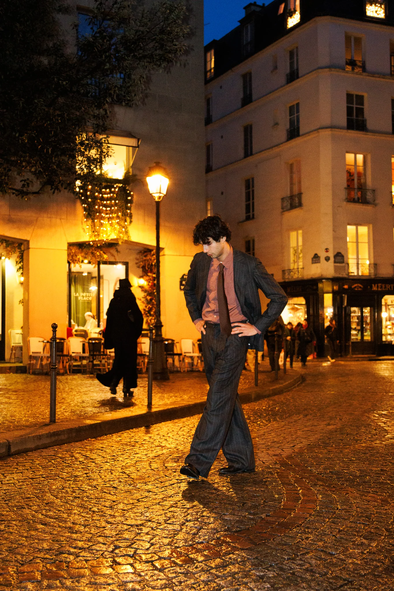 Model in Oliver Spencer FW26 collection on a Paris street, photographed by Campbell Jensen