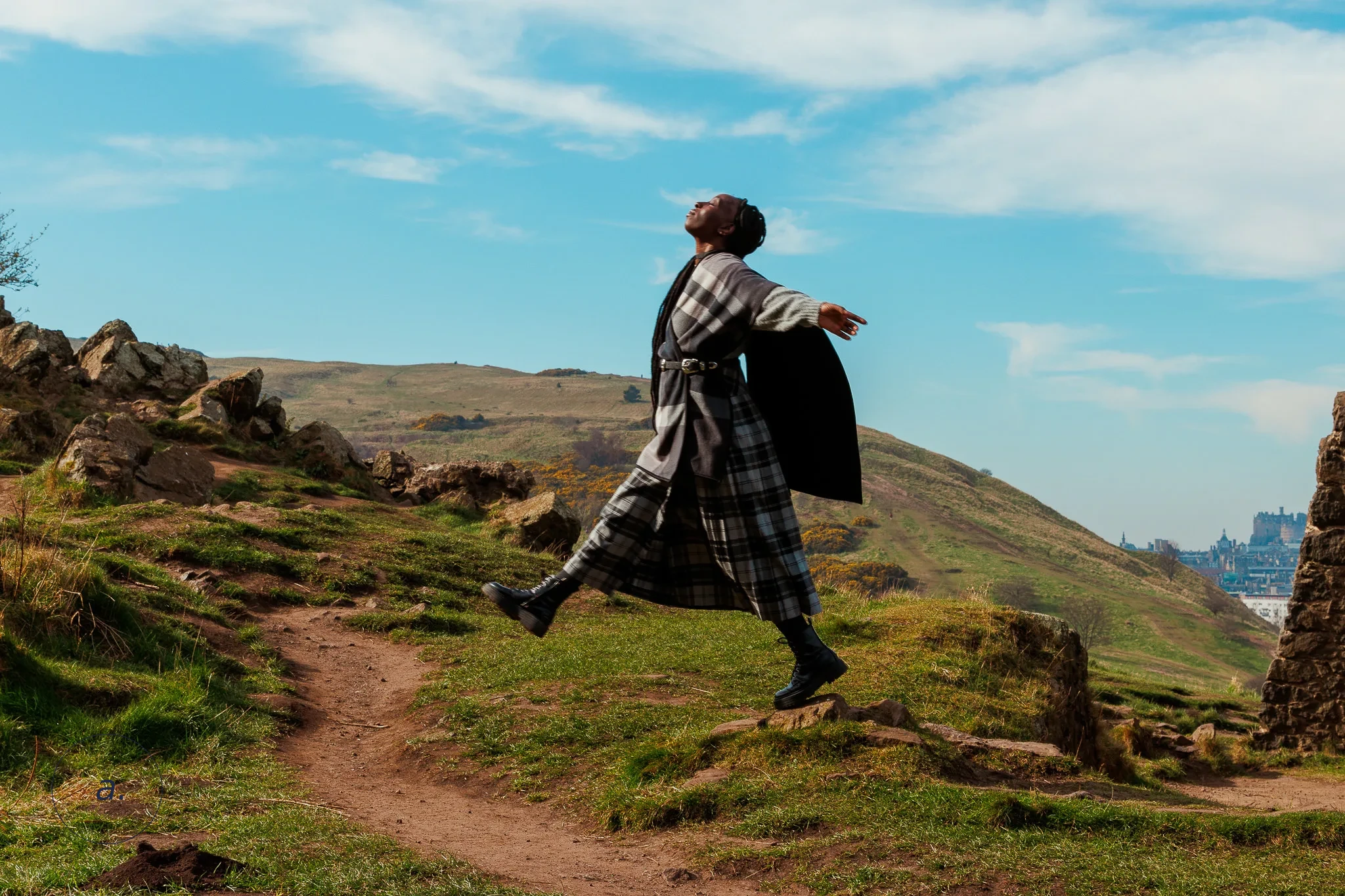 Model on Arthur's Seat against Edinburgh skyline, photographed by Campbell Jensen