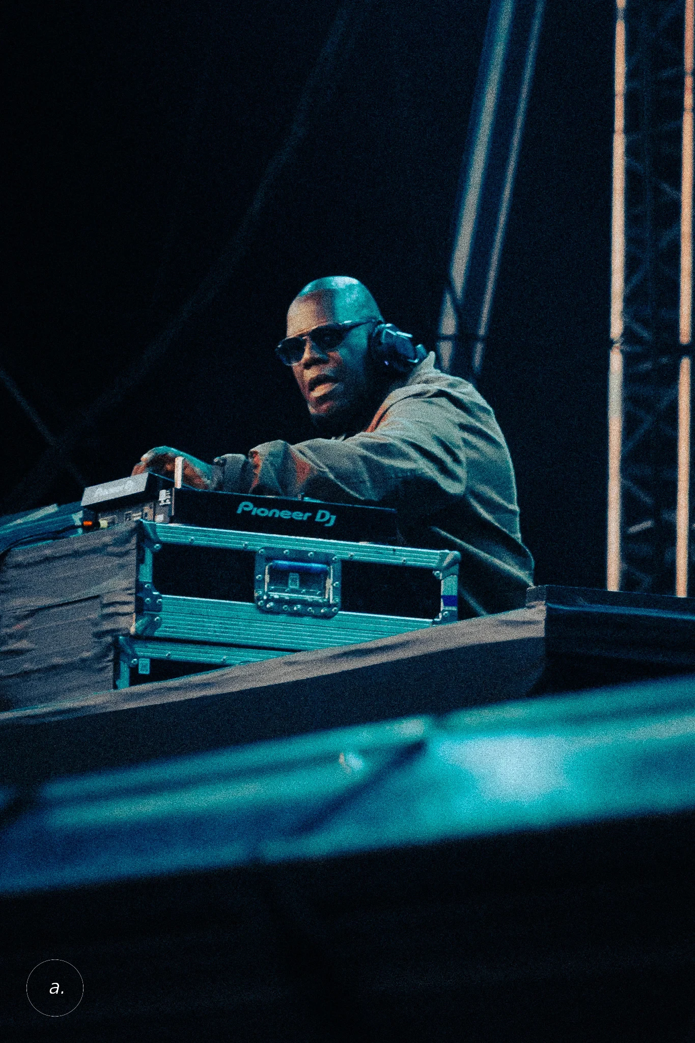 Carl Cox behind the Pioneer DJ deck, photographed by Campbell Jensen