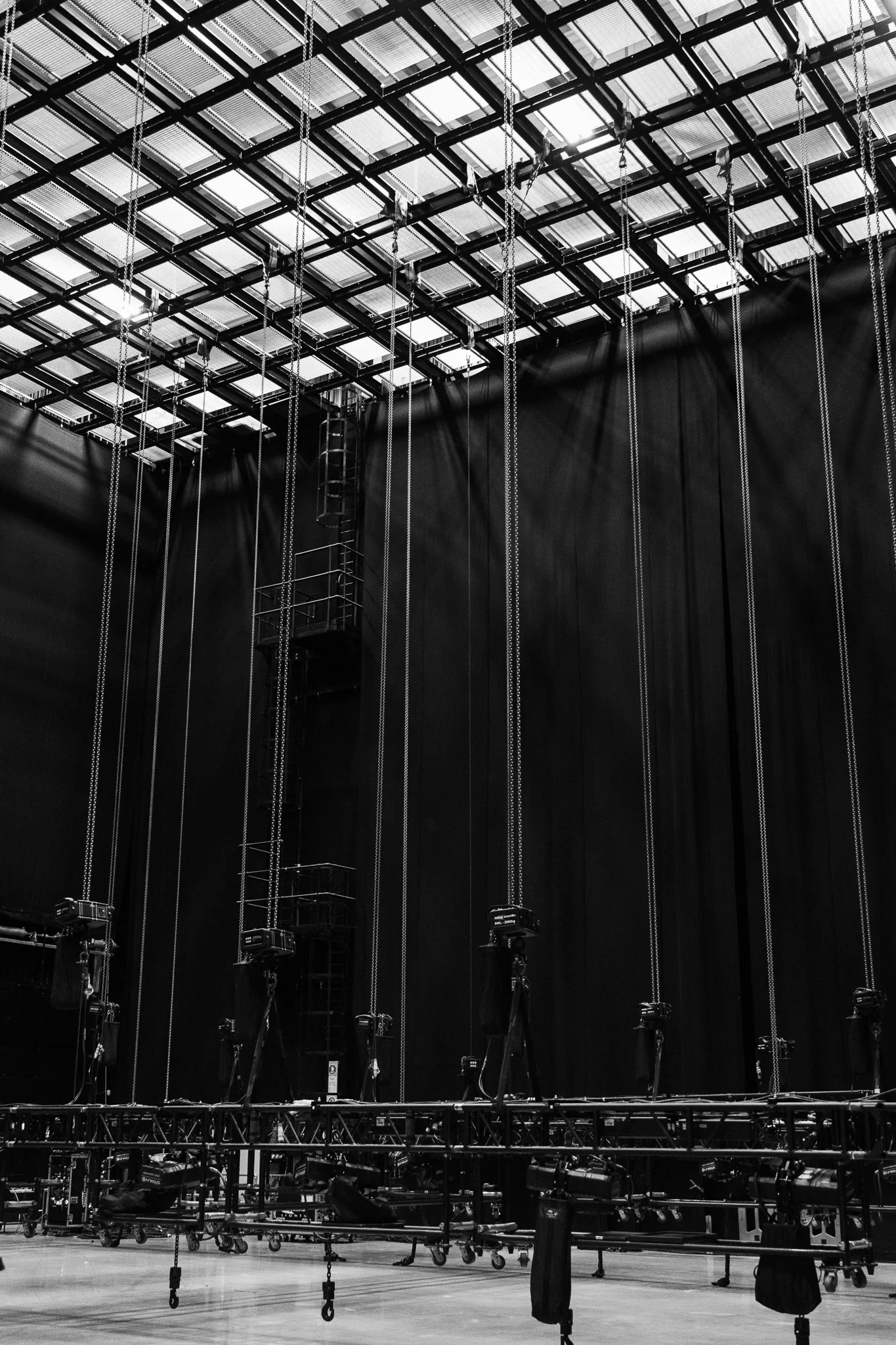 Rigging grid above the stage, Neg Earth Lights, London, photographed by Campbell Jensen