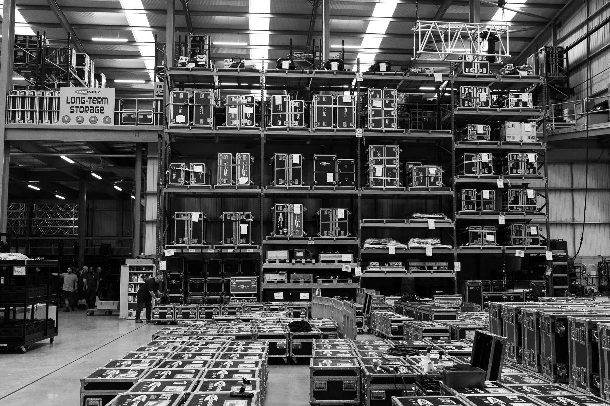Racked lighting fixtures in the warehouse, Neg Earth Lights, London, photographed by Campbell Jensen
