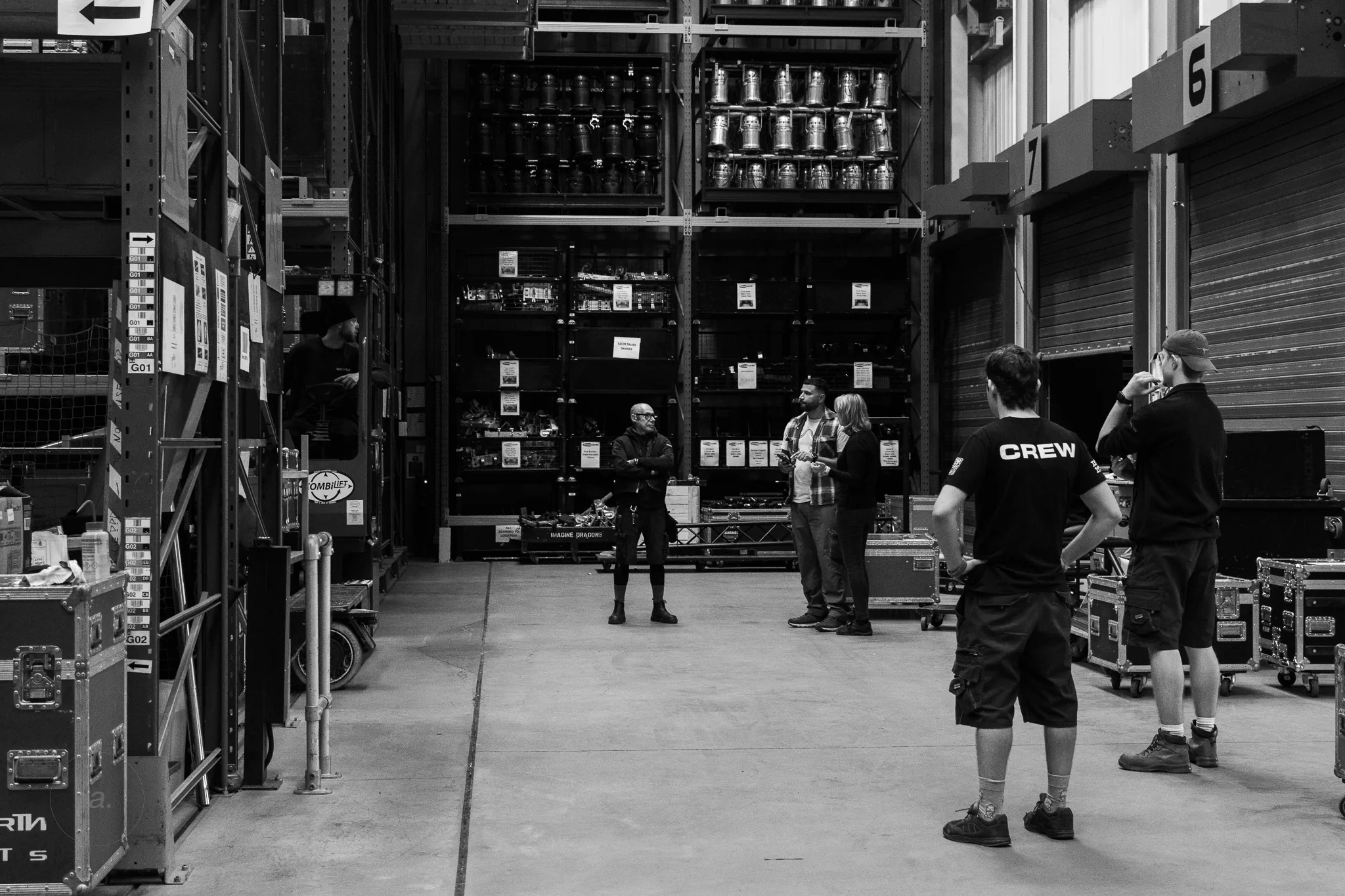 Crew preparing stock on the warehouse floor, Neg Earth Lights, London, photographed by Campbell Jensen