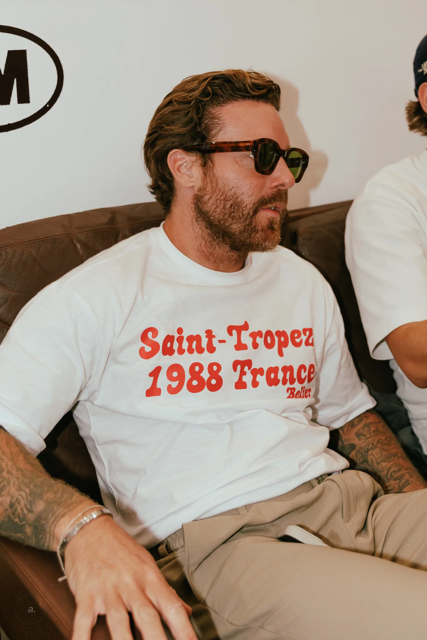 A guest relaxing on the sofa, Waiting for the Sun, Paris, photographed by Campbell Jensen